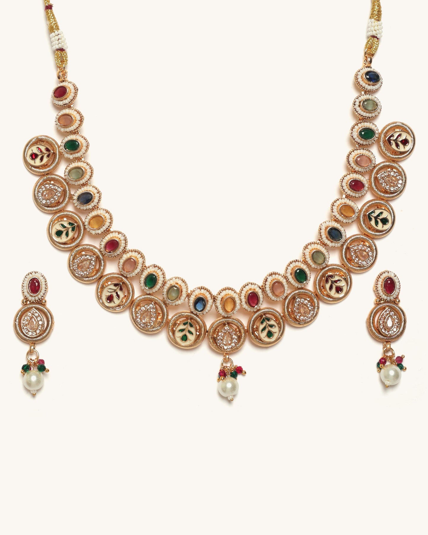 Ornate necklace with colorful gemstones on a white background