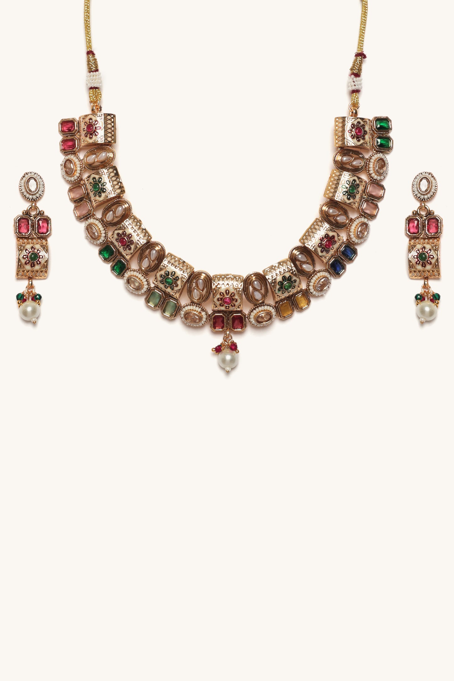 Ornate necklace with colorful gemstones on a white background