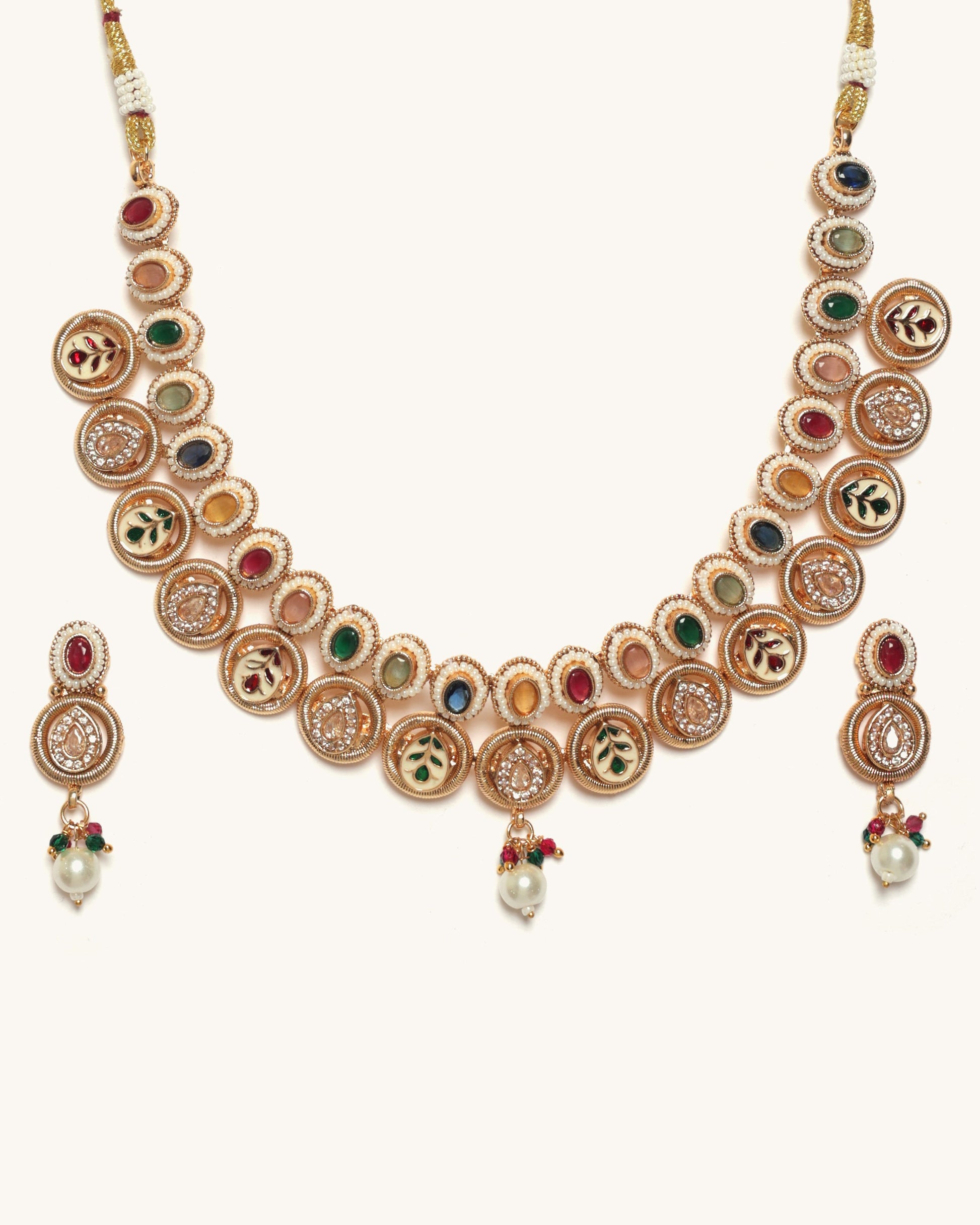 Ornate necklace with colorful gemstones on a white background